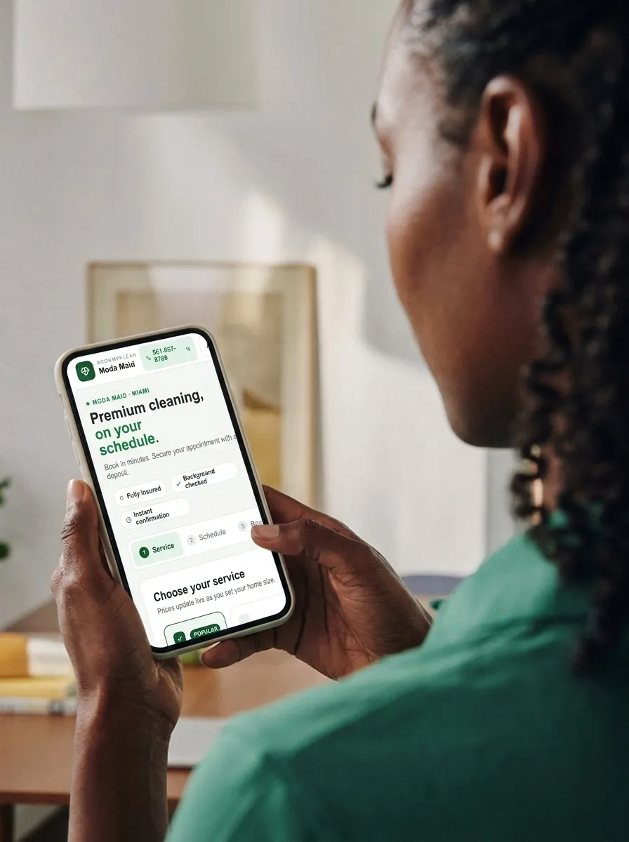A cleaning business owner viewing the ModaMaid booking page on her phone